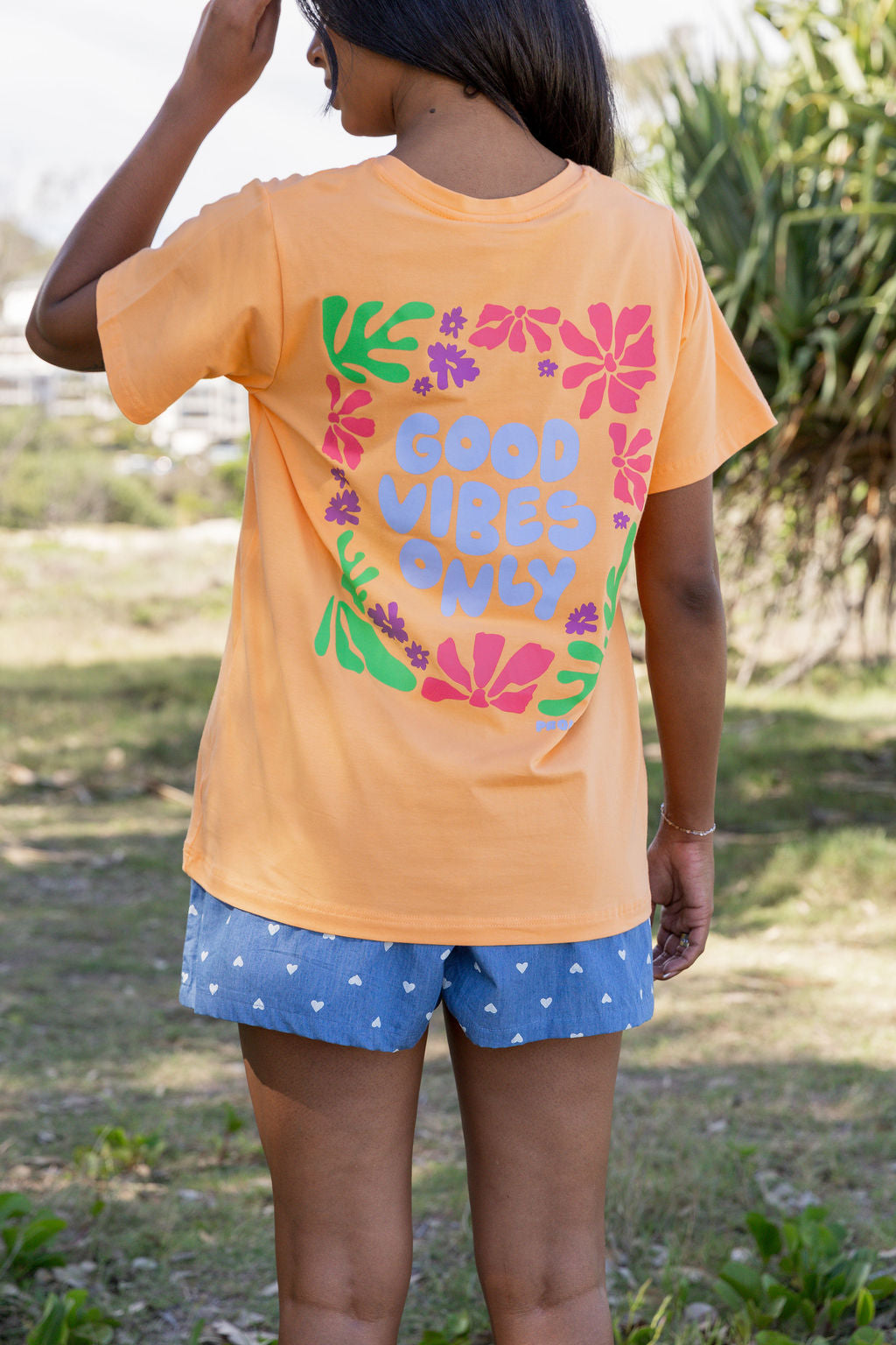 Good Vibes V-Neck Tee in Peach