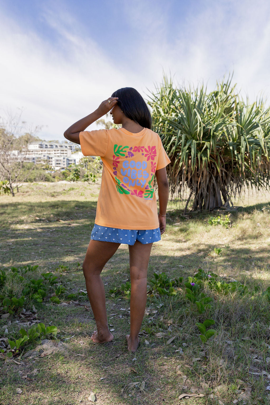Good Vibes V-Neck Tee in Peach