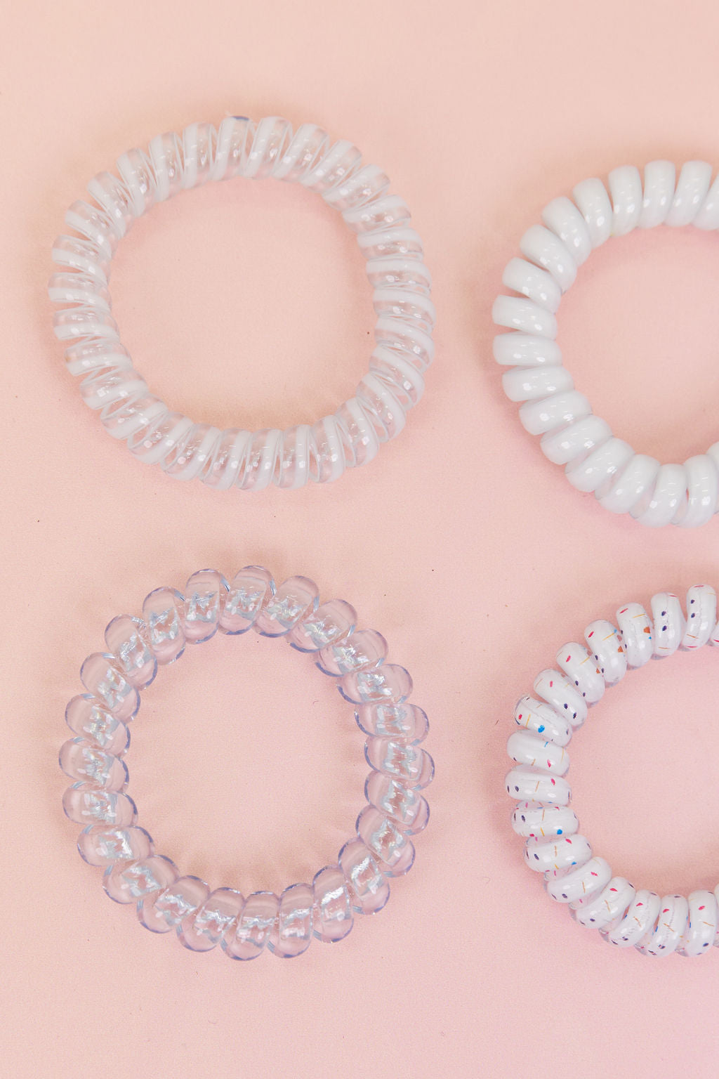White & Clear Coil Hair Ties – 4 Pack