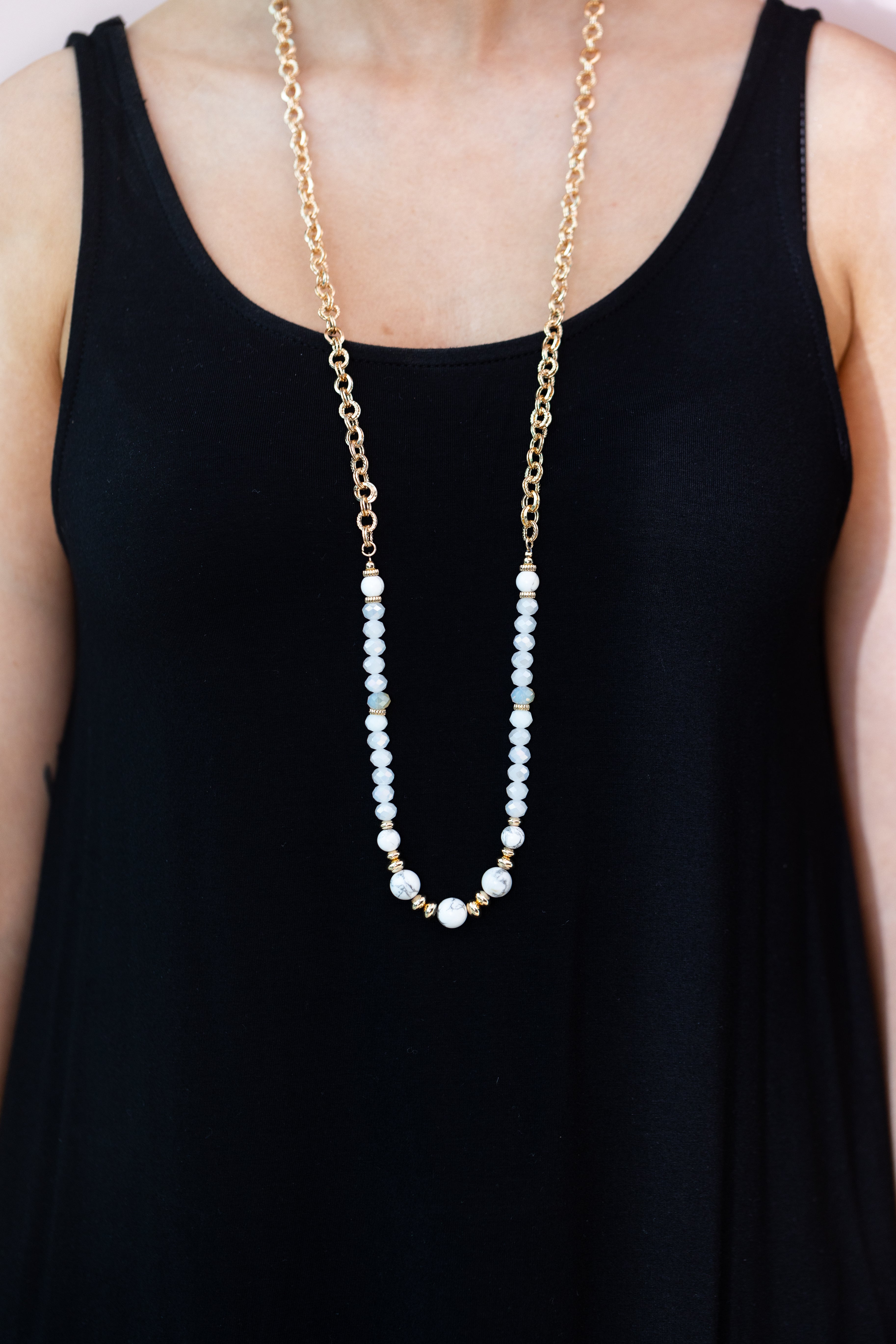 White beads store gold chain